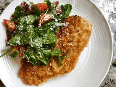 parmesan-chicken-paillard-salata-verde-arugula-end-of-season-toy-box-tomatoes-charred-lemon-beurre-blanc